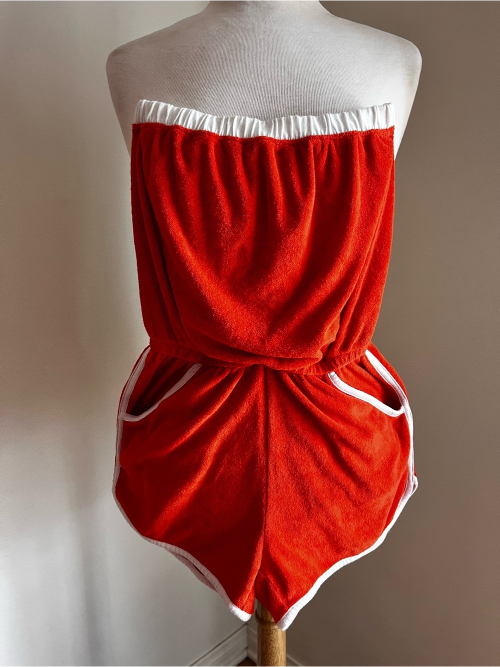 Orange and white strapless romper